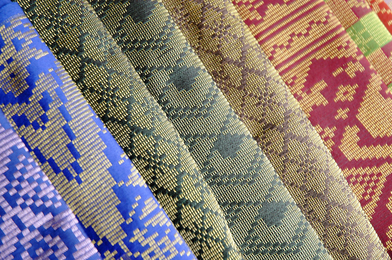 Full row of various handwoven songket textile