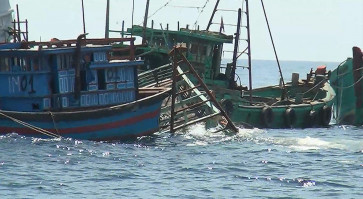 Indonesia sinks scores of boats to deter illegal fishing