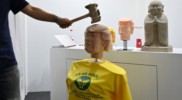 Trump-bashing gets physical at China tech show