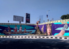 One of the murals on the Manahan overpass displays the National Sports Week (PON) torch light. The first PON was held in Surakarta in September 1948. JP/Ganug Nugroho Adi
