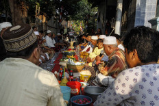 Residents hold a collective prayer after the inauguration of Wakare Museum on Aug. 16. They wish for the country’s acknowledgment of their land, which was owned and lived on by their ancestors before the occupation. JP/Arya Dipa.