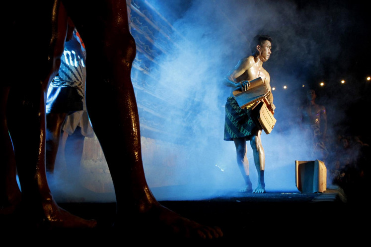 Traditional roof tile factory workers flaunt toned muscles for coveted Jatiwangi...