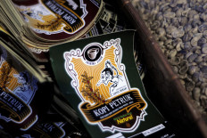 Kopi Petruk (Petruk coffee) is the name given to coffee produced in Deles, Klaten regency, Central Java, on the slope of Mount Merapi. Petruk is the nickname given by locals for Mount Merapi to symbolize protection. JP/Magnus Hendratmo