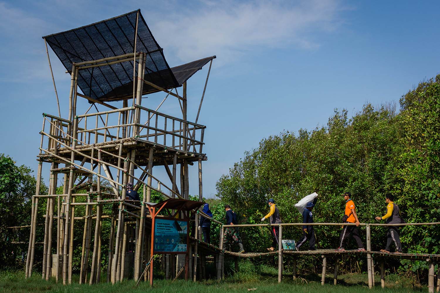 The Baros Youth Community, students from several universities in Yogyakarta and the Bantul Environmental Body work together to clean up trash in the Baros mangrove area. JP/Anggertimur Lanang Tinarbuko