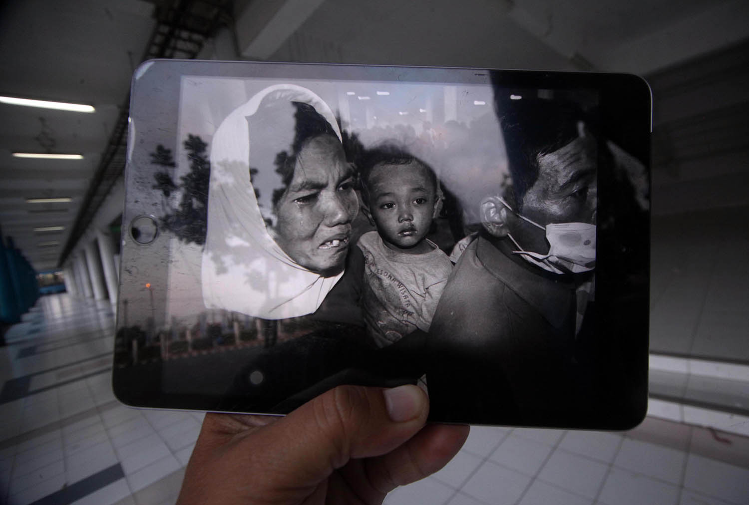 The alleys of Maguwoharjo Stadium serve as silent witness to the victims of the Mt. Merapi eruption. JP/ Boy T Harjanto