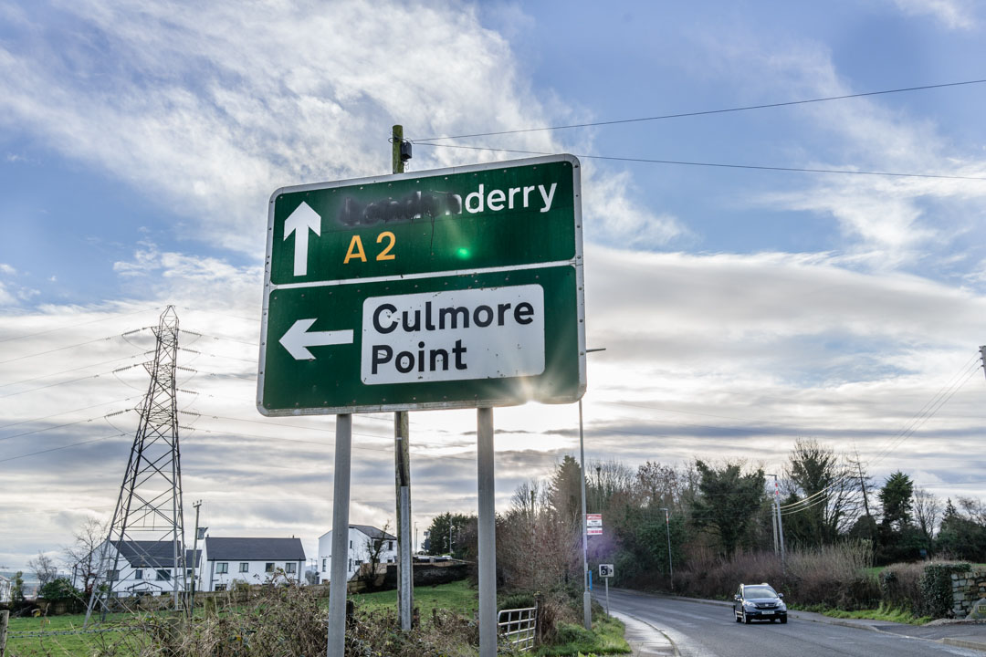 A vandalized road sign in Northern Ireland with the “London” in “Londonderry” covered with black paint. JP/Okky Ardya