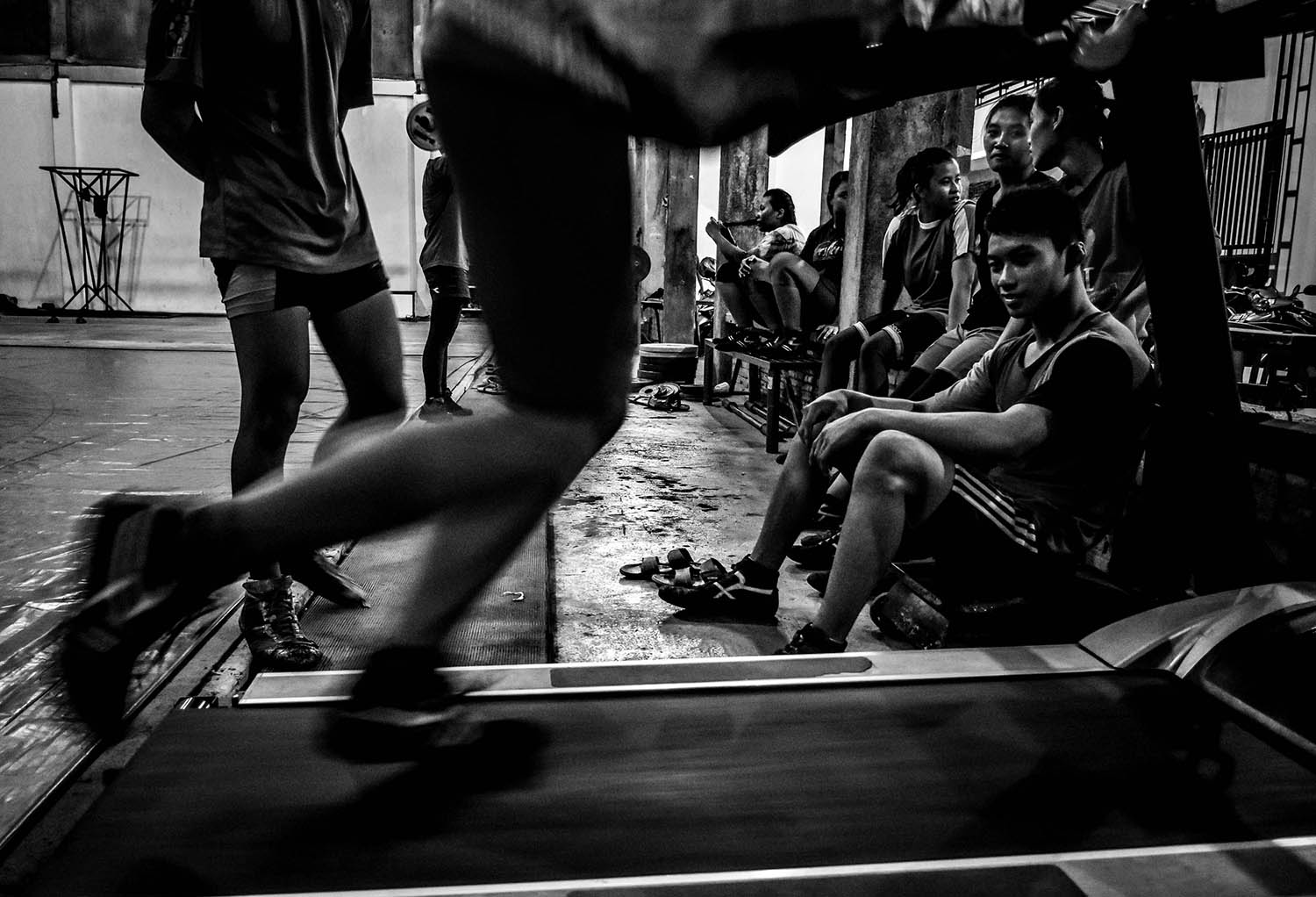 Several young athletes line up to train on the treadmill at the camp. JP/Aman Rochman