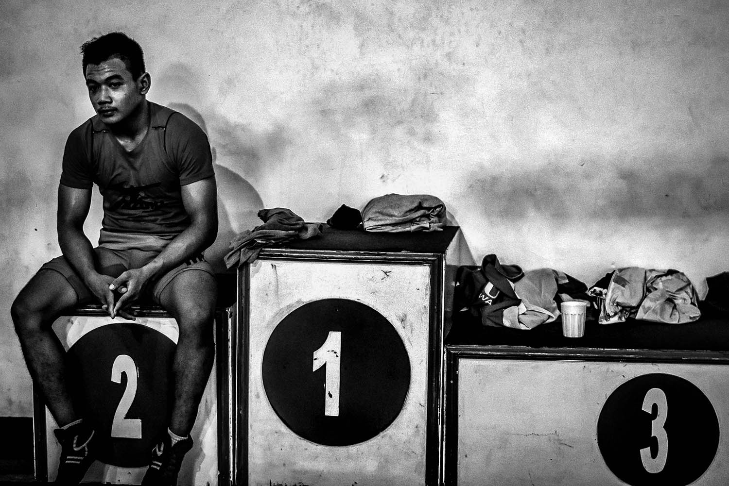 An athlete takes a break during training. JP/Aman Rochman