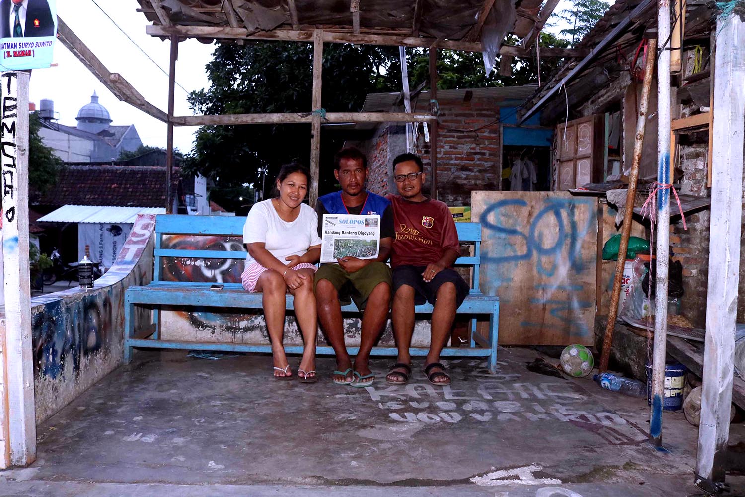 Joko Tri Budiantoro with his sister Ninuk Tri Astuti (left) and his brother in law, Kus Haryanto. Joko who is also a difable becomes a newspaper deliveryman since 2016. JP/Maksum Nur Fauzan