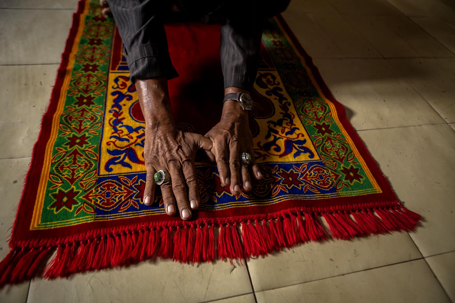 A trainee exercises a breathing technique developed by Imam on a sajadah (prayer mat). JP/Ramadhani