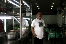 Itab (48) is the second generation running the Gumarang Jaya restaurant, a Minang-style restaurant established in 1986 in Medan, North Sumatra. JP/Andri Ginting