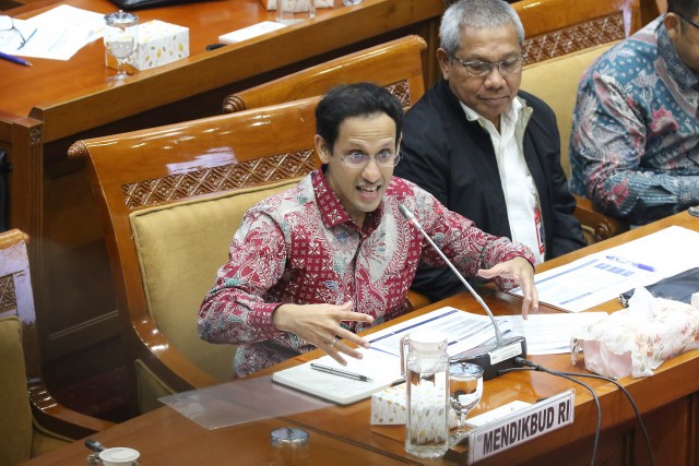 Education and Culture Minister Nadiem Makarim takes part in a session of House of Representatives Commission X at the House complex in Senayan, Central Jakarta, in December 2019.