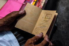Going places: A Hungarian visa stamp is seen on Doel’s old passport. JP/Anggertimur Lanang Tinarbuko