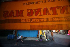 A gold shop in the area prior to opening hours. JP/Boy T Harjanto