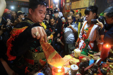 The tatungs (people possessed by gods or the spirits of ancestors) take part in a ritual before the Cap Go Meh parade in Singkawang, West Kalimantan. JP/HS Putra