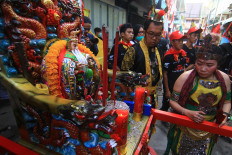 The tatungs wear costumes inspired by Chinese royalty of the past, mixed with Dayak tribal style. JP/HS Putra