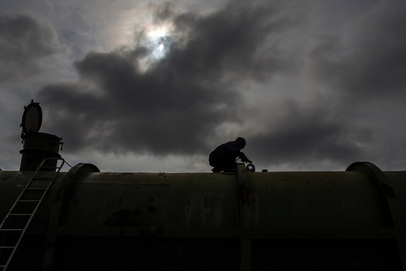 Hands on deck: A worker breaks up parts of a ship. JP/Afriadi Hikmal