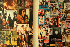 All-time greats: A collage of posters and stills of classic Indonesian films adorns a wall at Sinematek Indonesia, the first film archive in Southeast Asia. JP/Xena Olivia