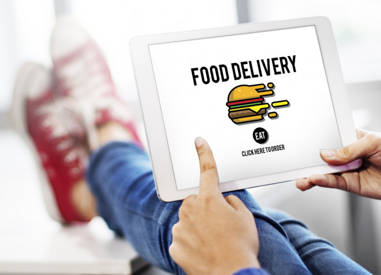GoFood, GrabFood provide contactless food delivery amid COVID-19 spread
