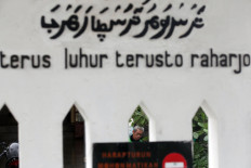 The mosque’s wall is decorated with Arabic and Javanese writings. JP/Boy T Harjanto
