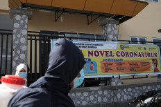 A community health center (Puskesmas) in Buranga subdistrict in Kaledupa Island installs a banner showing measures to curb the coronavirus spread. JP/ Edy Susanto
