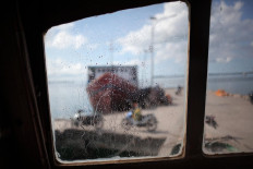 Aside from cabins and decks, a boat’s bridge also needs to be disinfected.  JP/ Edy Susanto