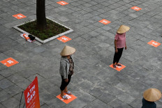 Vietnam to extend movement curbs in Ho Chi Minh as virus toll rises