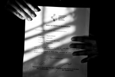 Hayatul shows an official letter declaring that she is healthy and free from coronavirus.  JP/Raudhatul Jumala