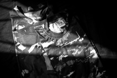 Hayatul keeps army shirts as a memento of her quarantine period at a military base in Natuna. JP/Raudhatul Jumala