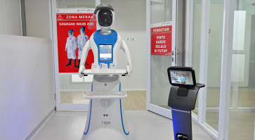 Indonesia rolls out droids in virus battle
