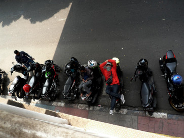 Surviving the streets of virus-stricken Jakarta