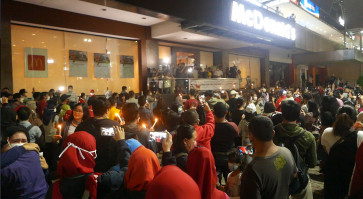 Customers ignore physical distancing to bid farewell to Indonesia's first McDona...