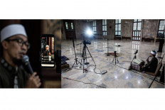 Deden Muhammad Ramadan, an ustadz (Islamic preacher), recites the Quran inside the empty hall of Sunda Kelapa Mosque in Central Jakarta, on April 29. JP/Seto Wardhana.