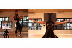 Owner of Body Fit Jakarta Inggita Syari Anindya performs a Zumba routine during an online class in Kemang, South Jakarta, on April 16. JP/Seto Wardhana