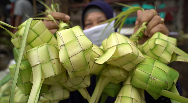 Palm leaf weavers pin hopes on ‘ketupat’