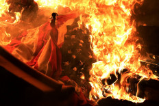 A U.S. flag burns during a protest near the White House in response to the killing of George Floyd May 31, 2020 in Washington, DC. Former Minneapolis police officer Derek Chauvin was fired then arrested for Floyd's death and is accused of killing Floyd by kneeling on his neck. Chauvin and three other officers, Tou Thao, J Alexander Kueng and Thomas K. Lane, were involved in Floyd's arrest on an accusation of "forgery-in-progress".  AFP/Getty Images/Alex Wong