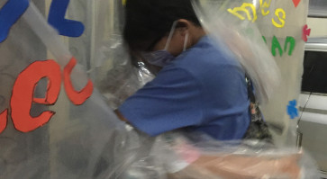 Grandmother makes ‘hug curtain’ to embrace family