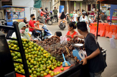 Some Pariaman residents are seen without masks in public. JP/Arif Rahman AS