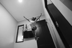 Ave practices a split leap. JP/Toto Santiko Budi