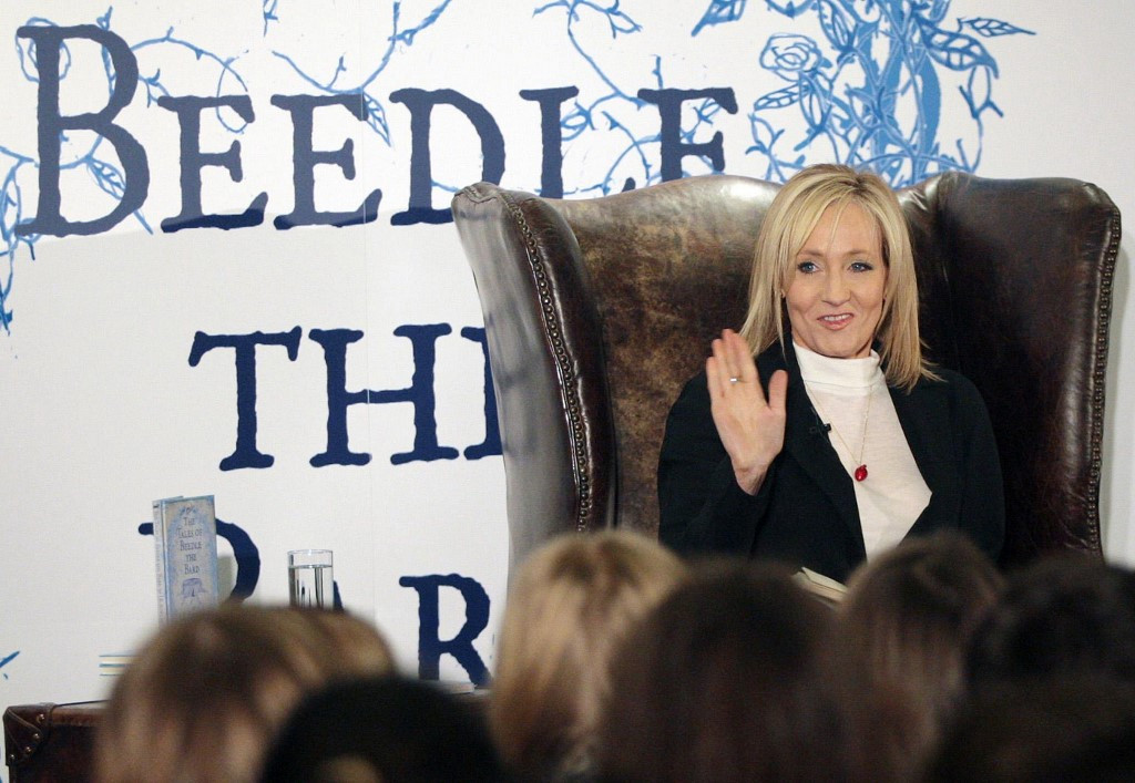From women to women: Author JK Rowling reads extracts from her new book 'The Tales of Beedle The Bard' to schoolchildren at a tea party at Edinburgh's Parliament Hall, on Dec. 4, 2008. Rowling on Monday launched Beira’s Place, an organization for women who have experienced sexual violence.