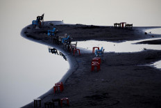 Chairs are left facing the banks of the Blue Nile river in Khartoum, Sudan, February 15, 2020. Reuters/Mohamed Nureldin Abdallah