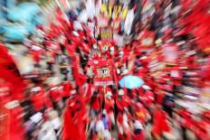Workers and students participate in a protest against the recently passed Job Creation Law in Jakarta on Oct. 20, coinciding with the first anniversary of Jokowi and Ma’ruf Amin’s term as President and Vice President respectively. JP/Seto Wardhana