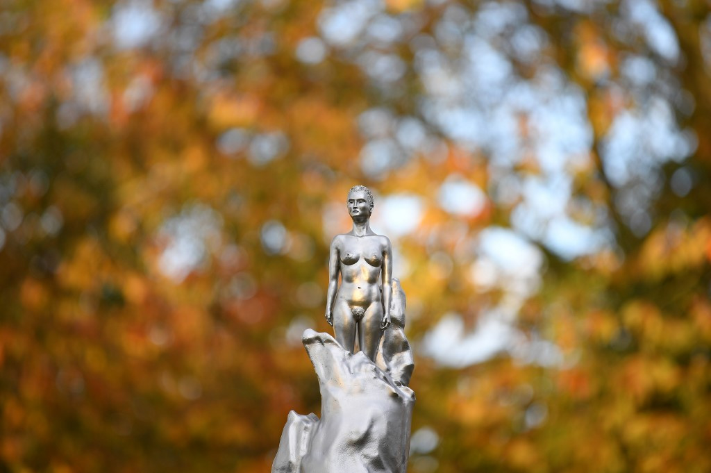 A picture shows a detail of a naked lady at the top of a new sculpture honoring 18th century British author and feminist icon Mary Wollstonecraft by British artist Maggi Hambling after it was unveiled in north London's Newington Green on November 10, 2020 close to where Wollstonecraft lived and worked.