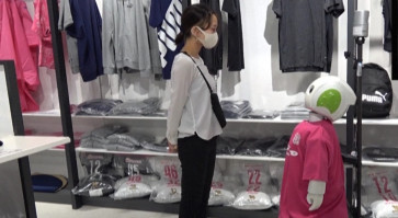 Robot in Japan reminds people to wear masks