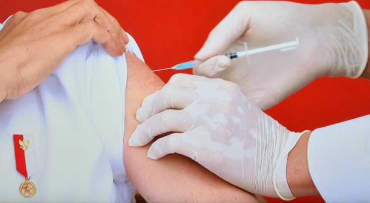 Jokowi’s first jab kick-starts nationwide vaccination program