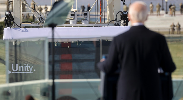 Biden vows to unite a divided America