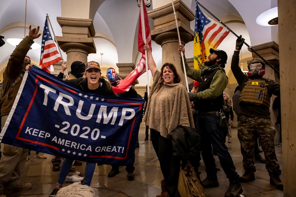 Supporters of US President Donald Trump protest inside the US Capitol on January 6, 2021, in Washington, DC. - Demonstrators breeched security and entered the Capitol as Congress debated the 2020 presidential election Electoral Vote Certification. 