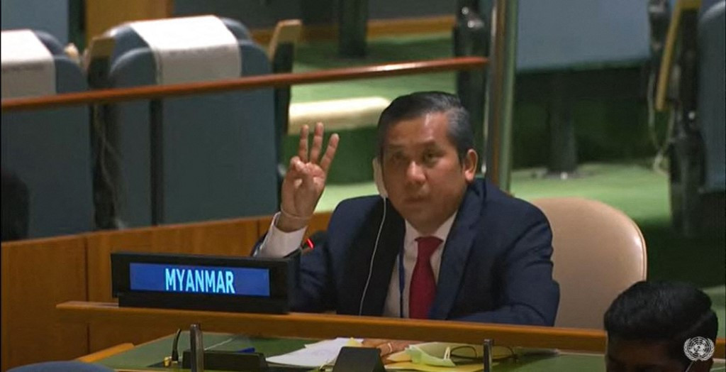 This screengrab of handout video made available on the United Nations' YouTube channel shows Myanmar's ambassador to the UN Kyaw Moe Tun making a three-finger salute as he addresses an informal meeting of the United Nations General Assembly on February 26, 2021 in New York. 