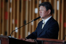 Japan, ASEAN envoy to Myanmar vow to cooperate on resolving crisis